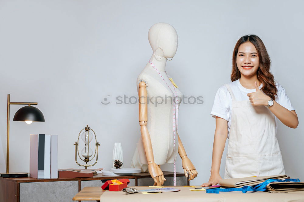 Similar – Young woman with kitchen knife