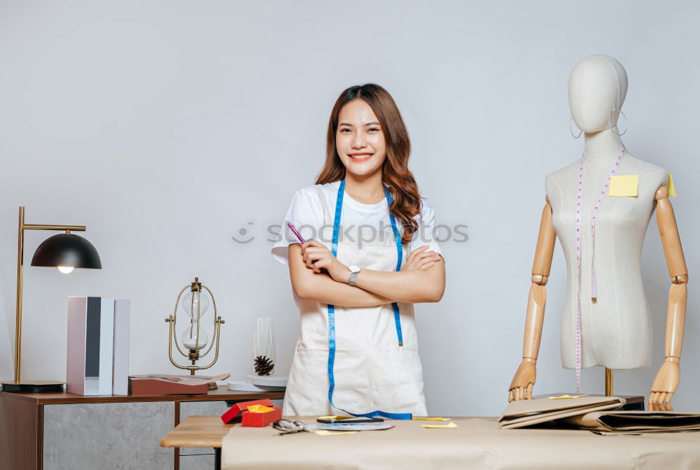 Similar – Young woman with kitchen knife