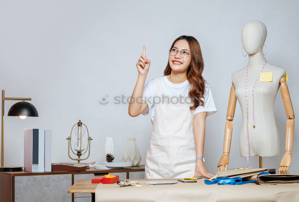 Similar – Young woman with kitchen knife