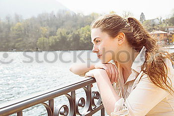 Similar – Young dreamy woman at seaside