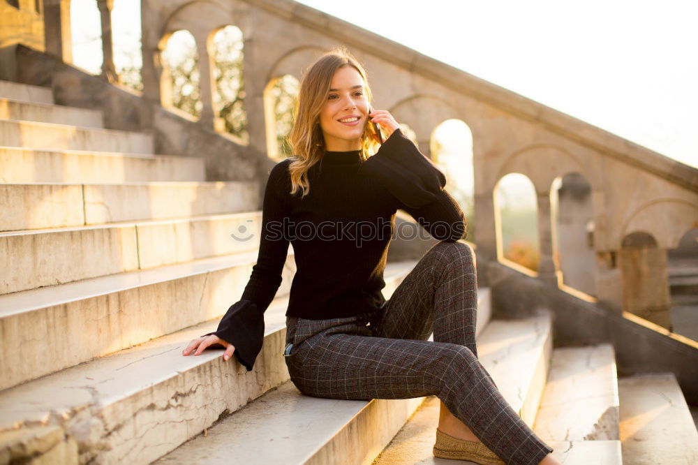 Similar – Image, Stock Photo Beautiful young blonde woman smiling on urban steps.