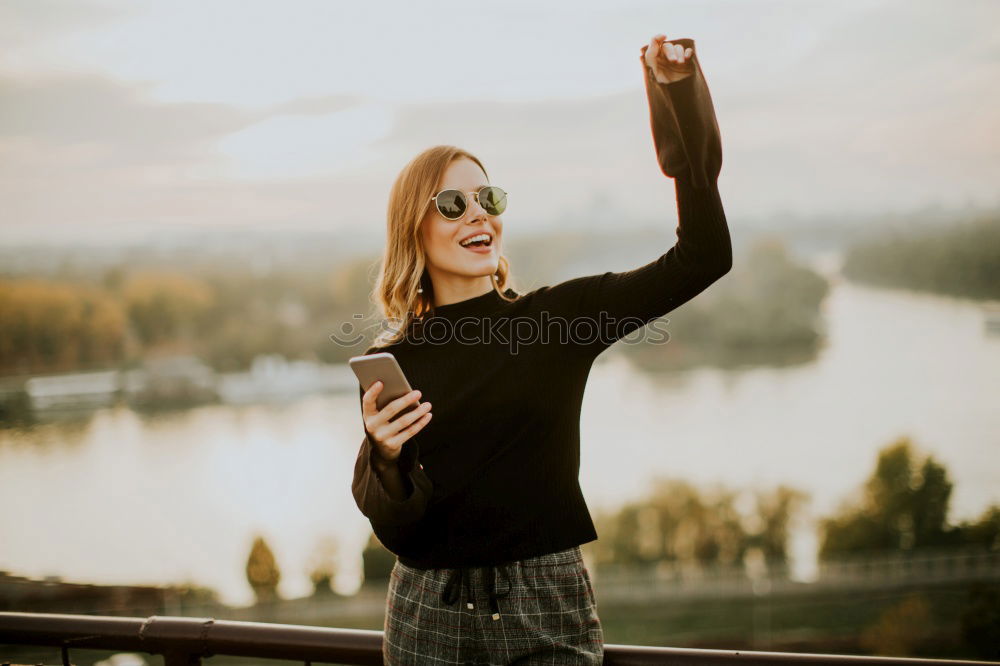 Similar – Image, Stock Photo Lady with camera on shore near stones and water