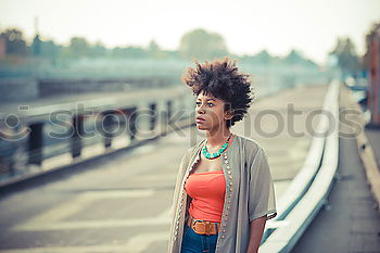 Image, Stock Photo Gorgeous black woman in dress on street