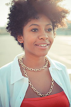 Similar – Image, Stock Photo Young black woman, afro hairstyle, smiling outdoors