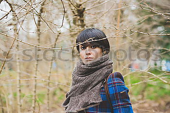 Similar – Teen alone in a park with her camera