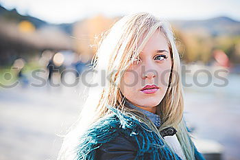 Similar – Image, Stock Photo Young girl with closed eyes wearing hat and scarf