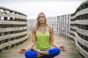 Similar – Image, Stock Photo Woman doing yoga in nature. Lotus figure on wooden bridge.