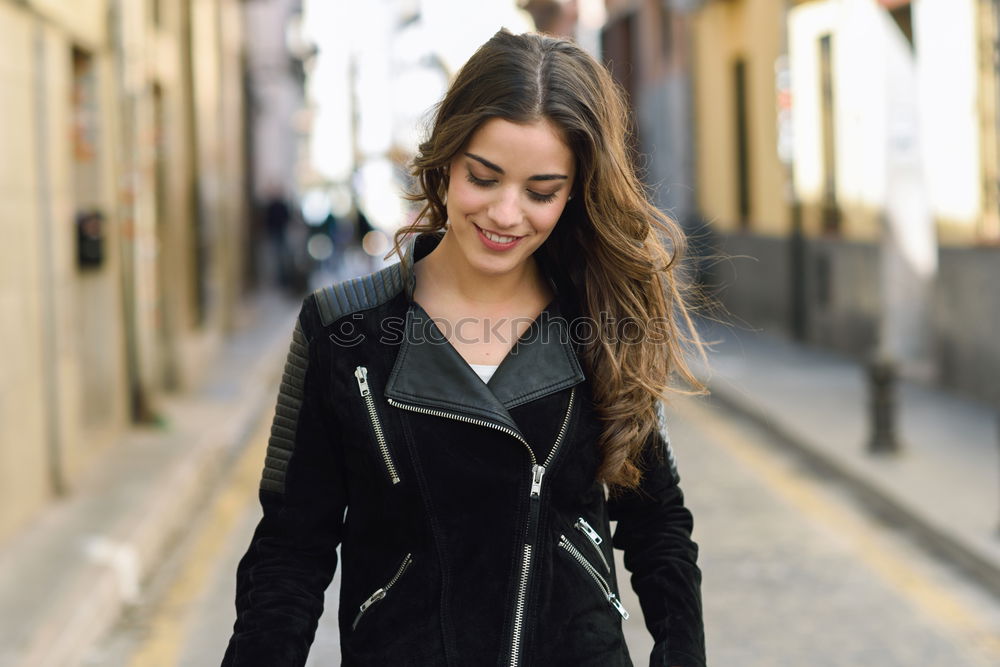 Similar – Image, Stock Photo Brunette woman texting on her mobile phone