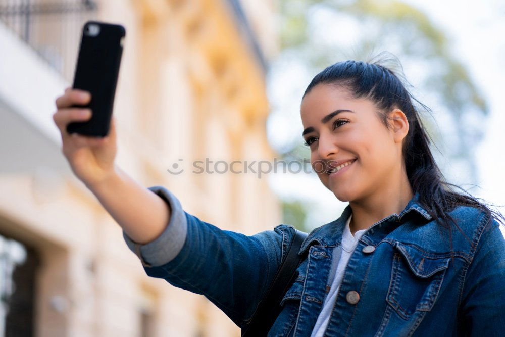 Similar – Front view of a young smiling african american woman standing