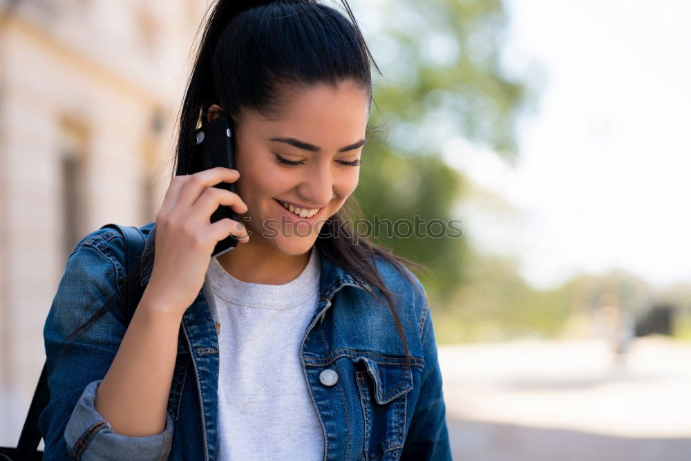 Similar – Image, Stock Photo Portrait of a cheerful young african woman standing outdoors