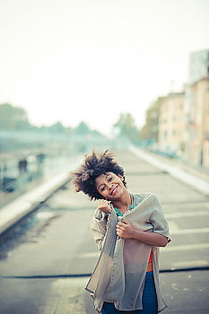 Similar – Image, Stock Photo Young woman hugging herself alone in nature