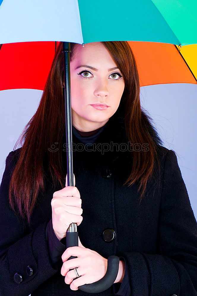 Similar – Young woman with red umbrella red nails and red lipstick