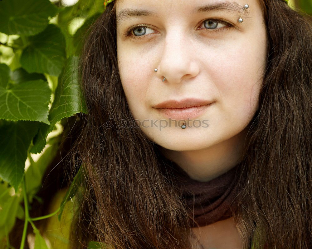 Similar – Young natural woman with freckles and wild curly hair looking at the camera