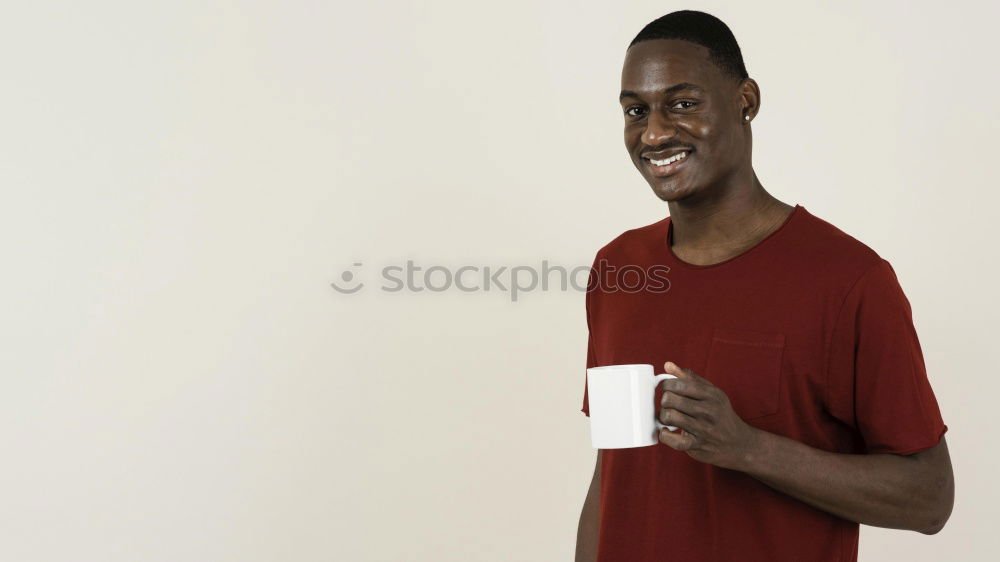 Similar – Young handsome black man holds a ice cream