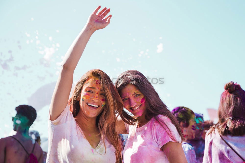 Similar – Young adult best friends cheering with confetti on party