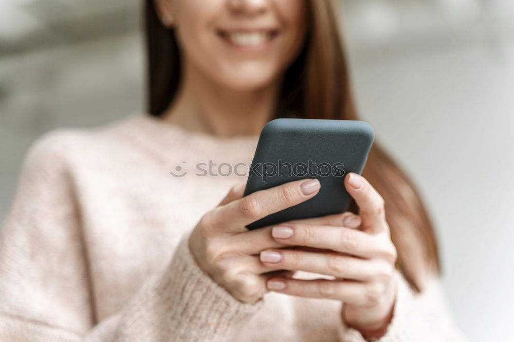 Similar – Young asian woman smiling and using tablet