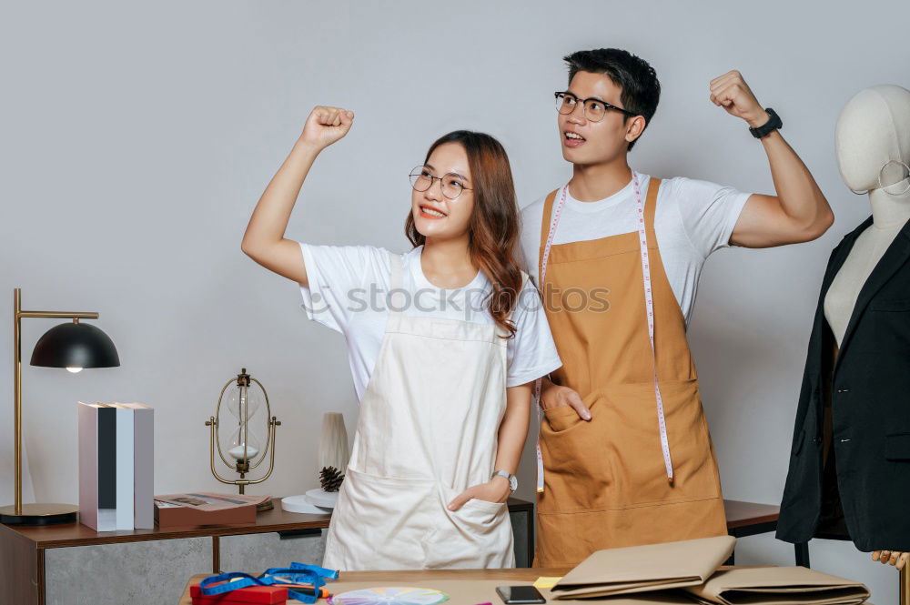 Similar – Young woman with kitchen knife