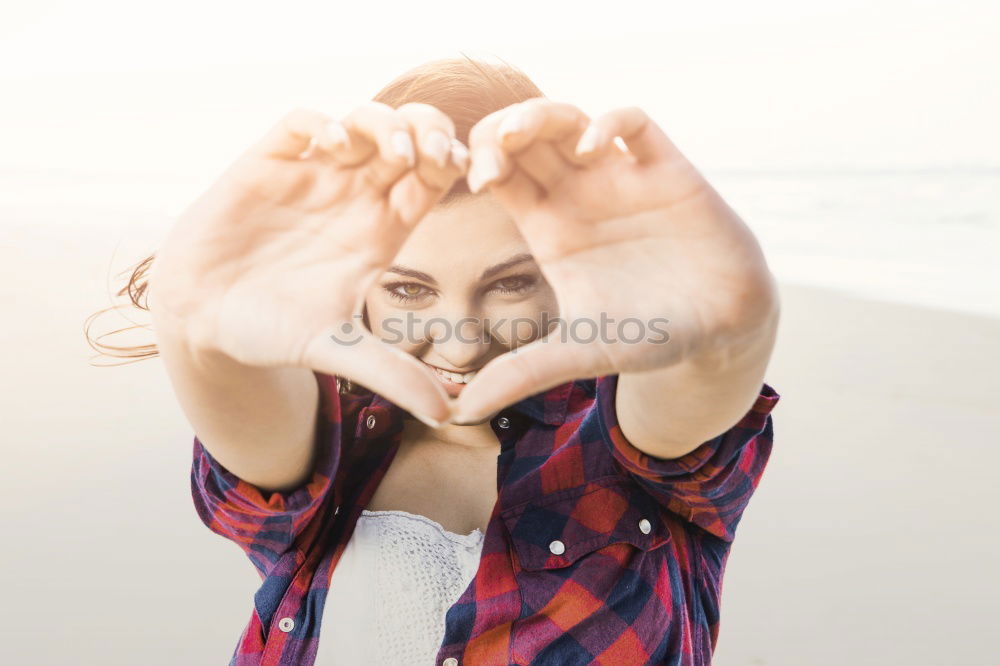 Similar – Young woman with hearts painted in her legs