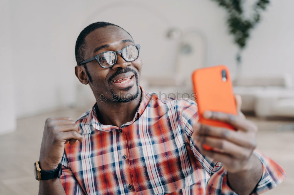 Similar – Image, Stock Photo American man using mobile in the street.