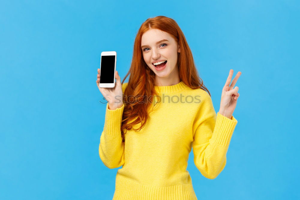 Similar – Cheerful woman in yellow jacket