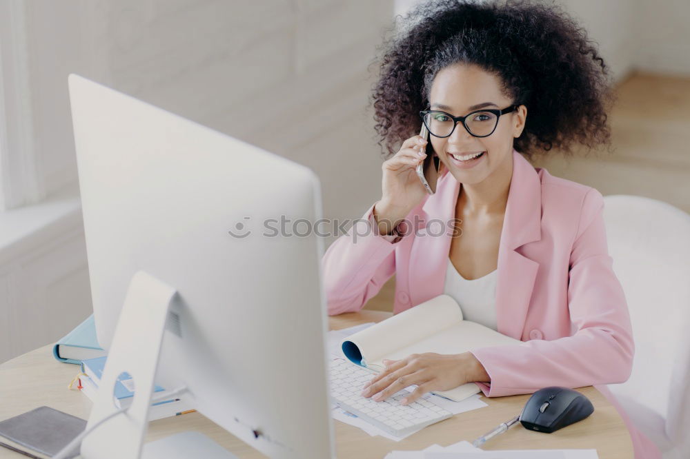 Similar – Beautiful afro american woman using mobile and laptop in the coffee shop.