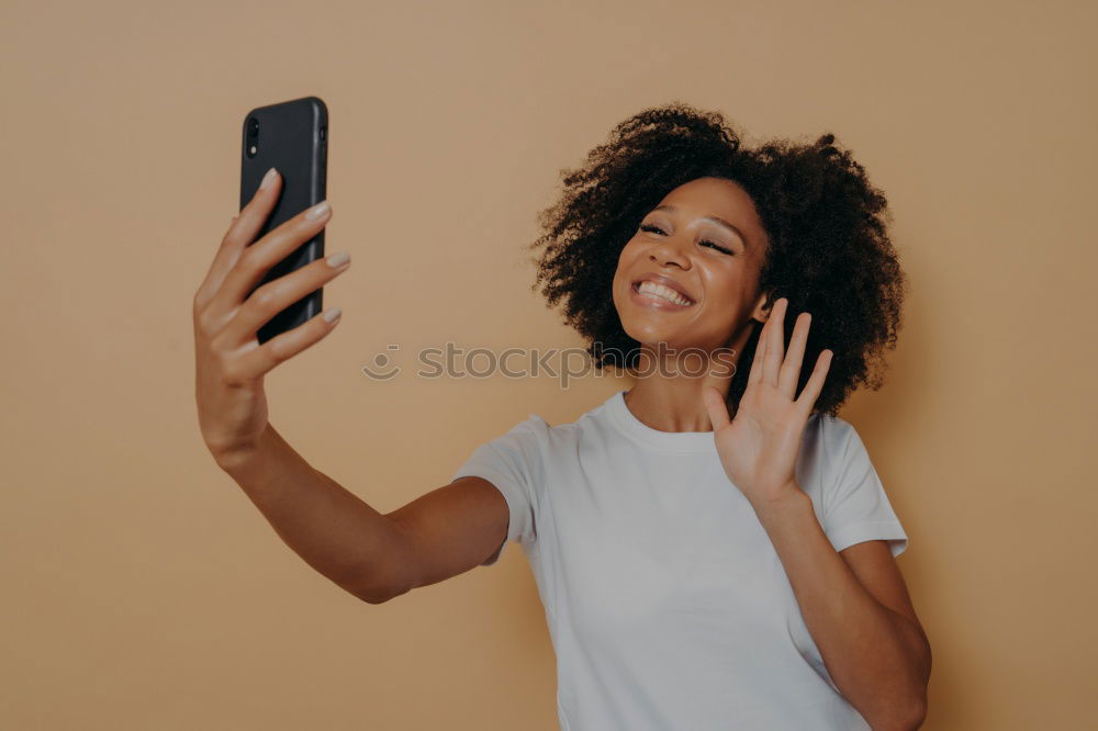 Similar – Image, Stock Photo Happy Arab girl listening to music and dancing
