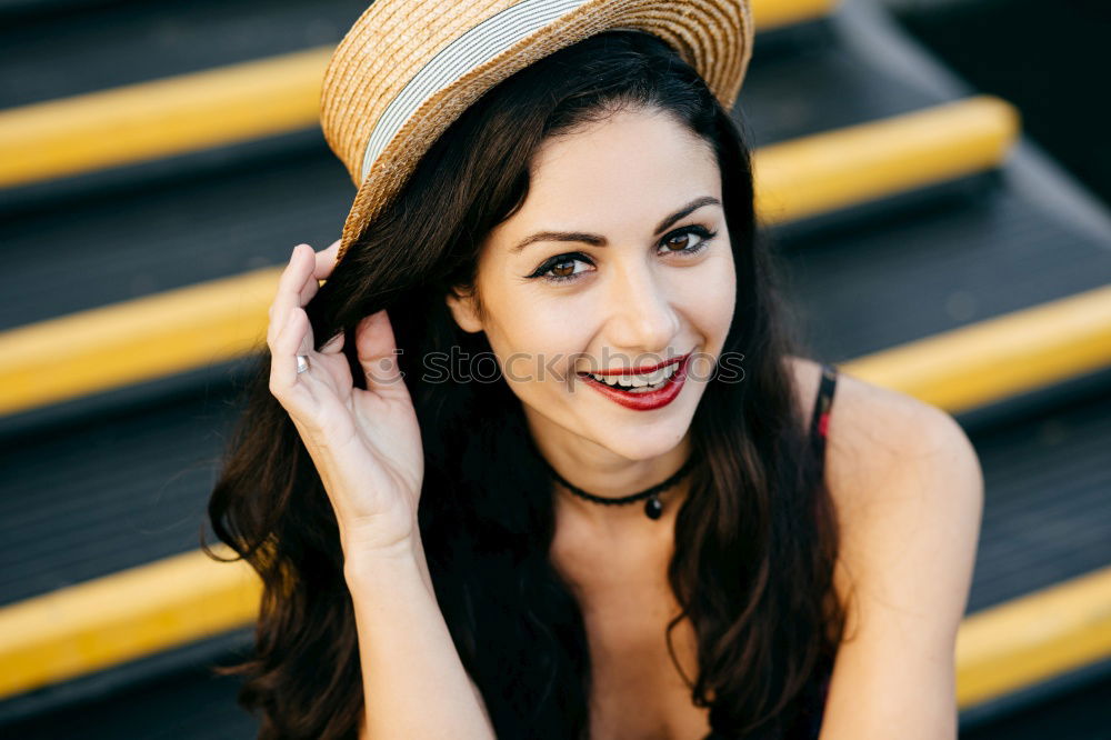 Similar – Beautiful Smiling Woman in red coat with mobile phone in hands, smartphone, urban scene