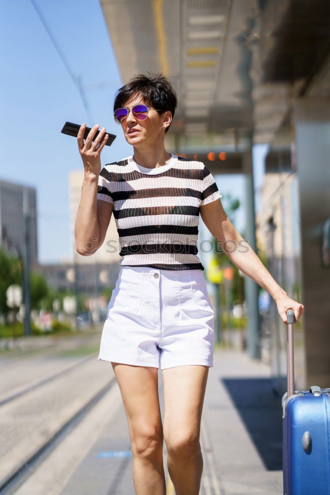 Similar – Image, Stock Photo Young Arab woman tourist waiting her train in a subway station