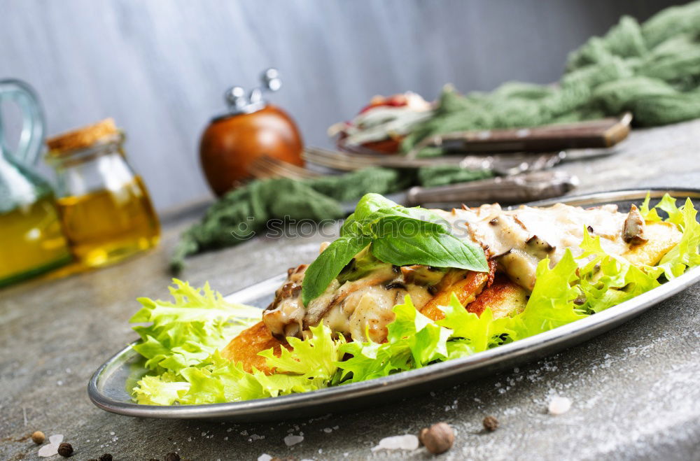 Similar – Image, Stock Photo Mediterranean goat cheese baked in parchment paper