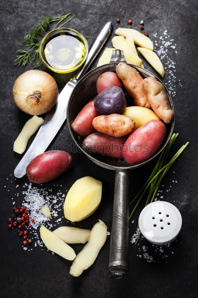 Similar – Image, Stock Photo Potatoes with rosemary, garlic and spices, ingredients