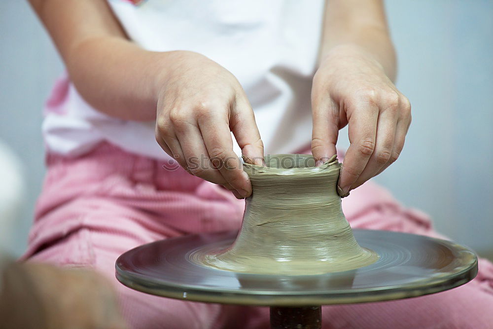Similar – Image, Stock Photo Hand playing yoga bowls outdoors.
