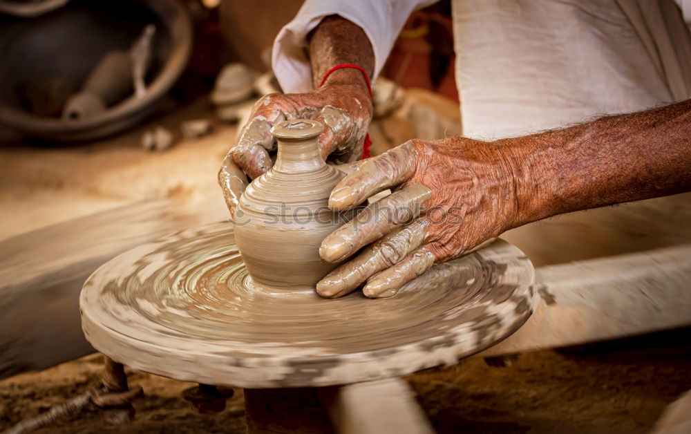 Similar – Image, Stock Photo Hands of a potter forming clay
