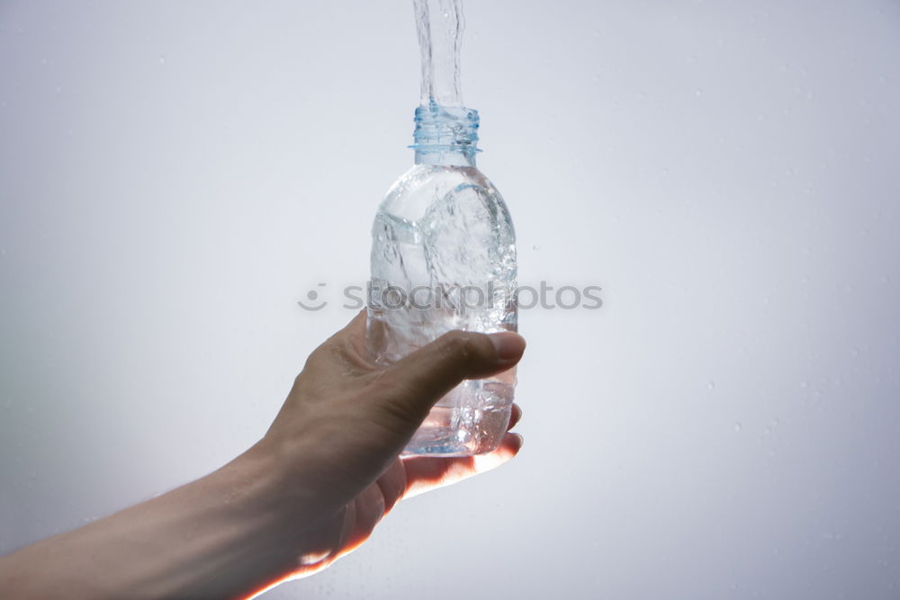 Similar – Boy holding vase with water near face