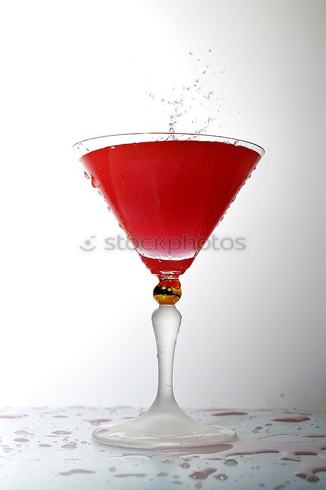 Similar – Hot spicy  cocktail in martini glass