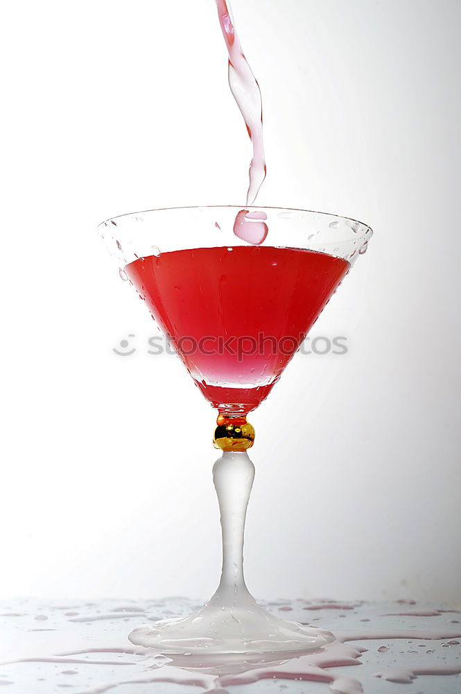 Similar – Hot spicy  cocktail in martini glass