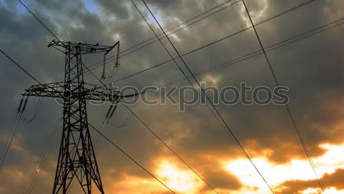 Similar – Power cables and lines on masts, birds and a street lamp