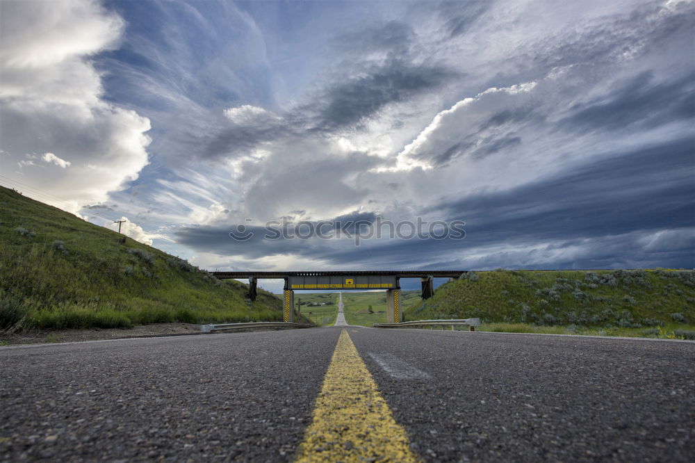 Similar – Ondulated and empty road in the sub-artic icelandic landscape