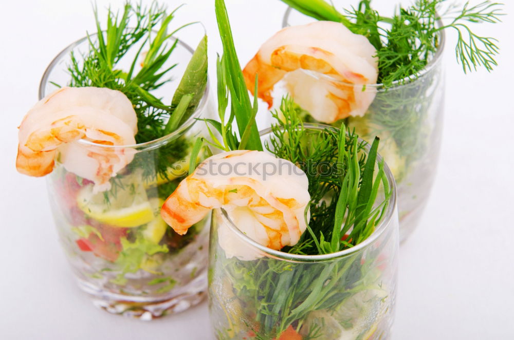 Similar – Pickled cucumbers made of home garden vegetables and herbs