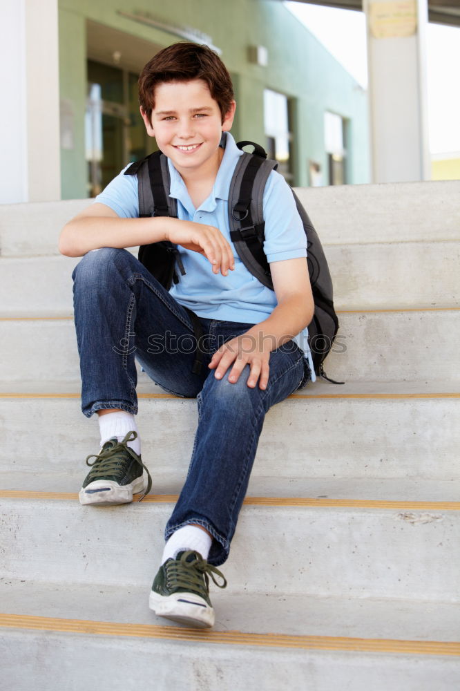 Similar – Cheerful child carrying his backpack ( back to school concept )