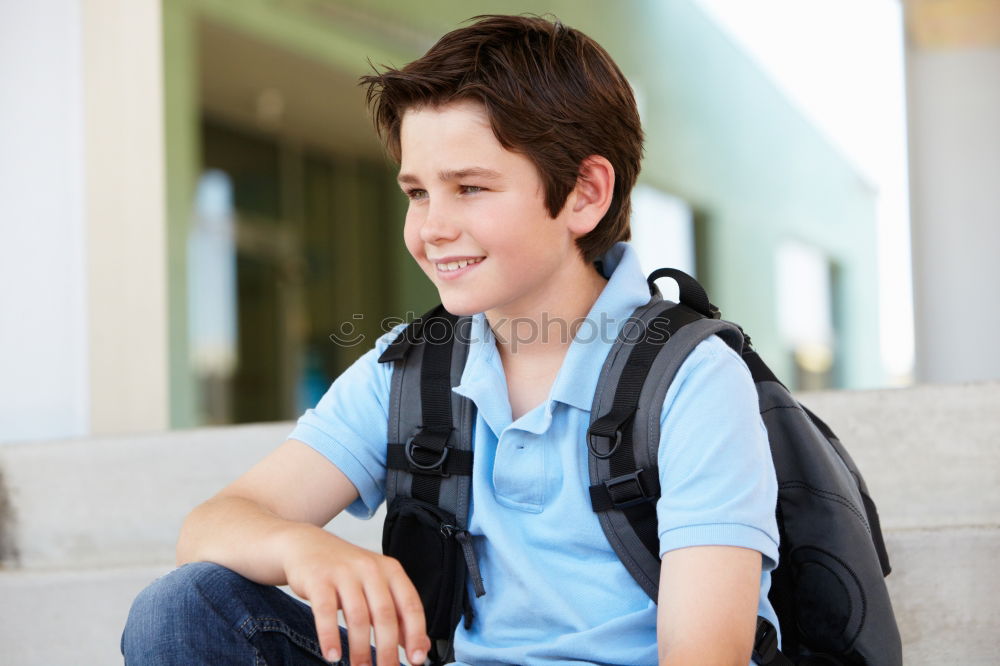 Similar – Cheerful child carrying his backpack ( back to school concept )