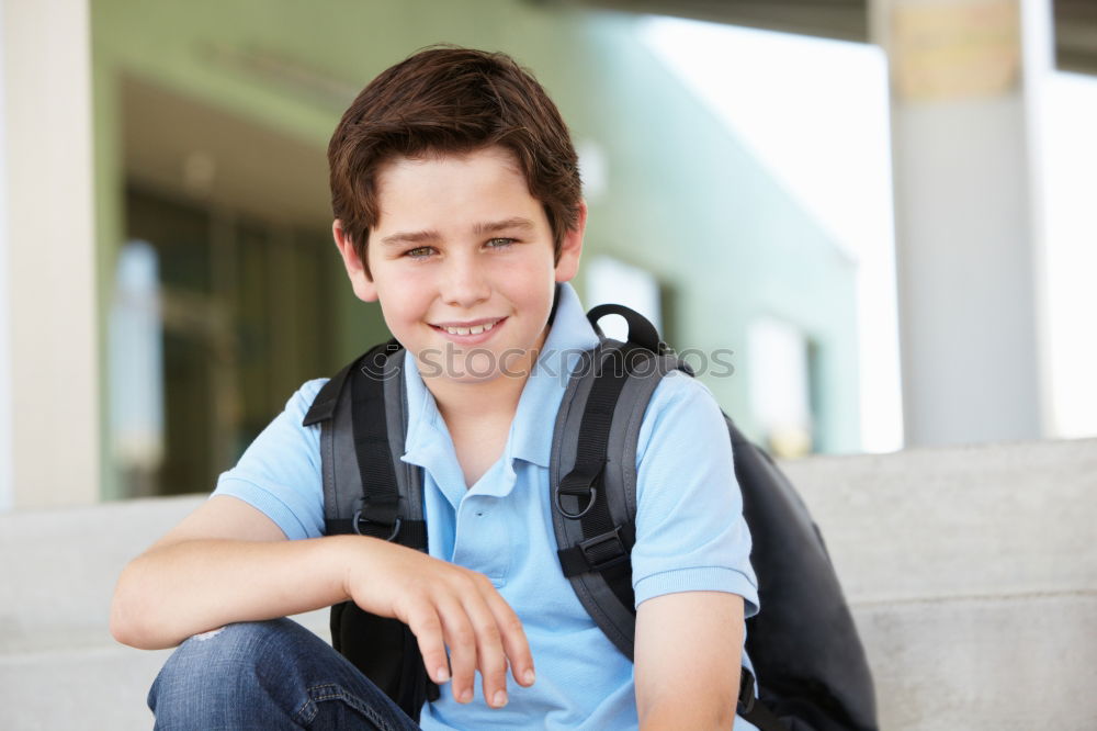 Similar – Cheerful child carrying his backpack ( back to school concept )