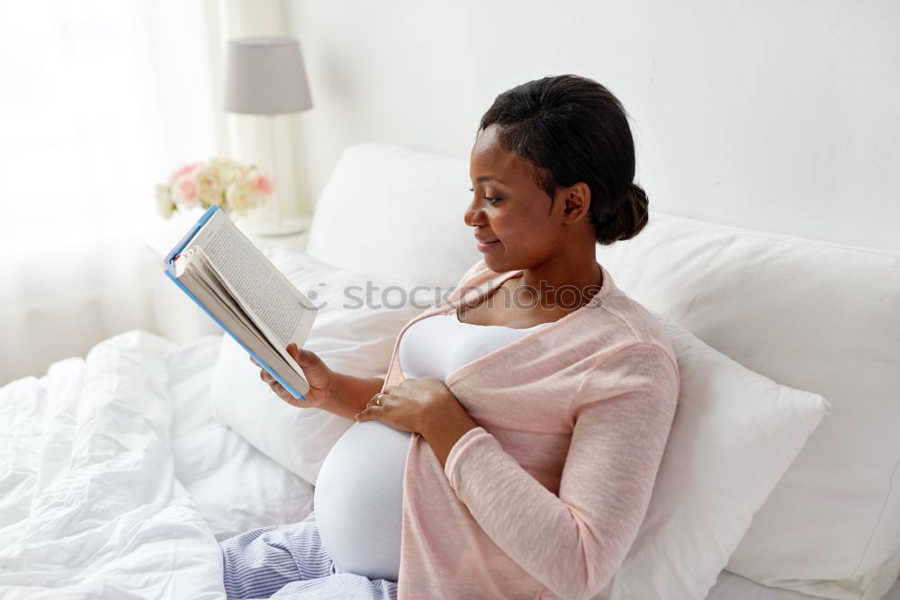 Similar – Happy beautiful young black woman relaxed lying down in the bed