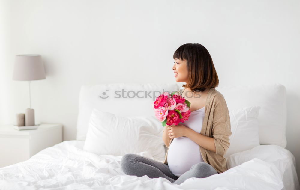 Similar – Image, Stock Photo Soft photo of a woman on the bed with an old book and a cup of coffee