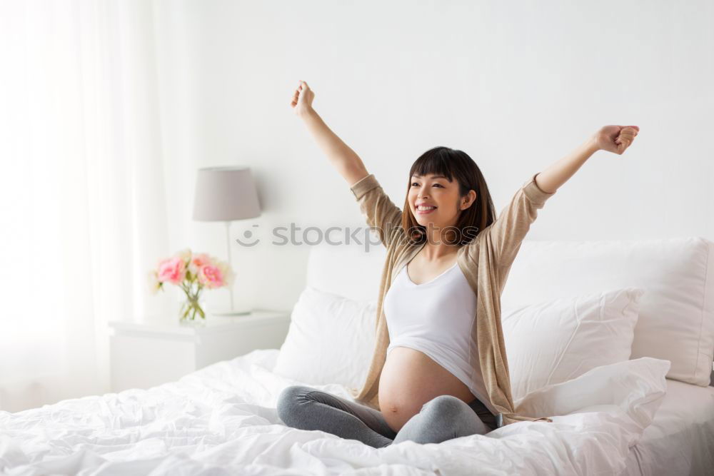 Similar – happy sleepy kid girl stretching in her room