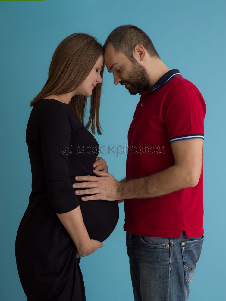 Similar – Image, Stock Photo Happy pregnant couple feeling the movements of their baby