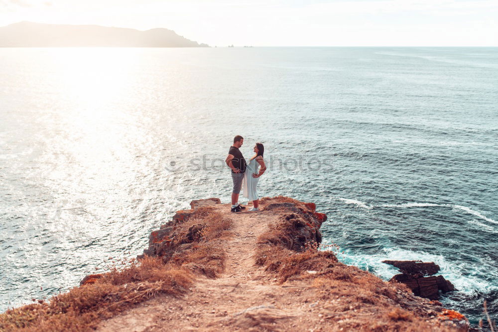 Similar – Image, Stock Photo Smiling woman offering to follow her near sea