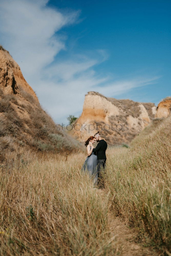 Similar – Image, Stock Photo Women walking on sandy hill