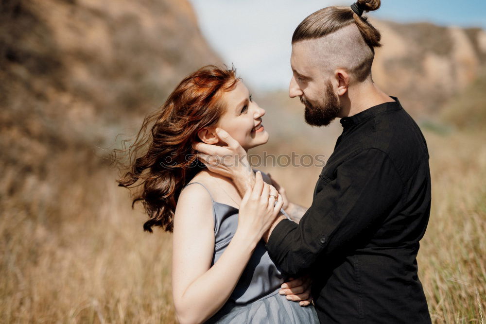 Similar – Image, Stock Photo Happy couple hugging and kissing near tree in park