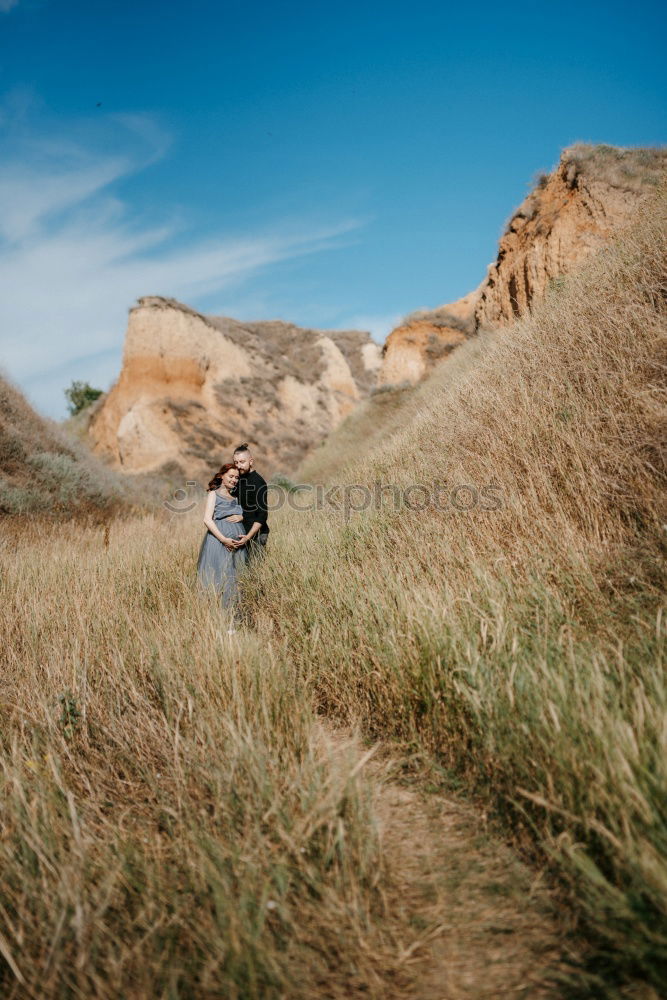 Similar – Image, Stock Photo Women walking on sandy hill