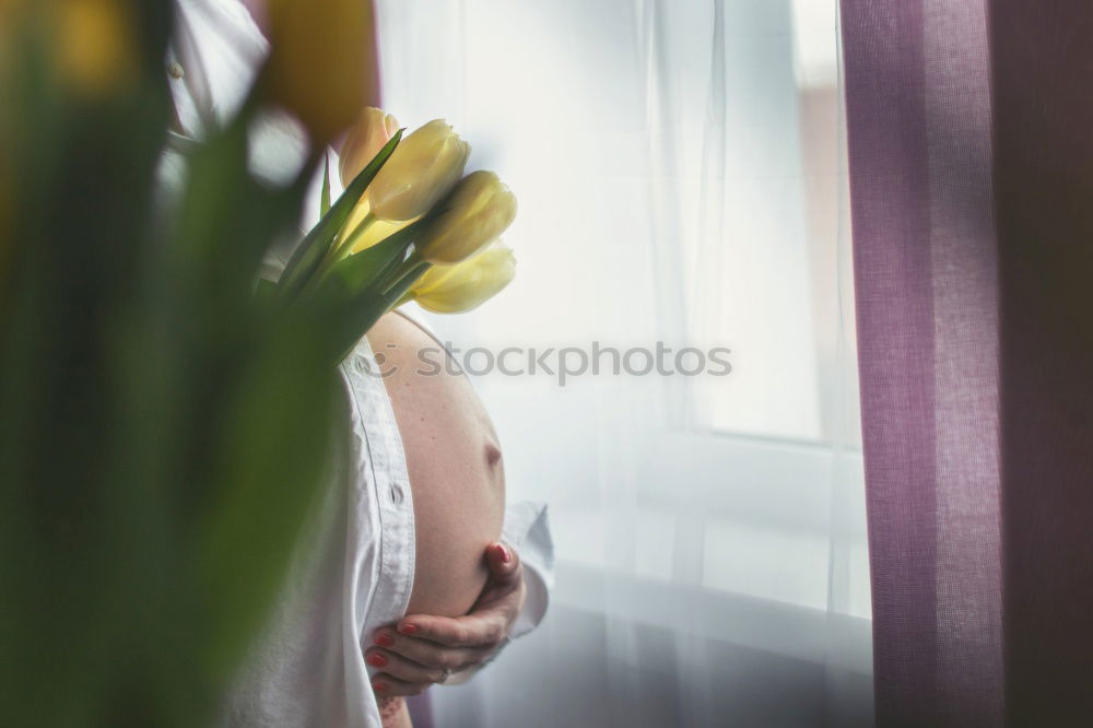 Similar – Baby and mom to the window